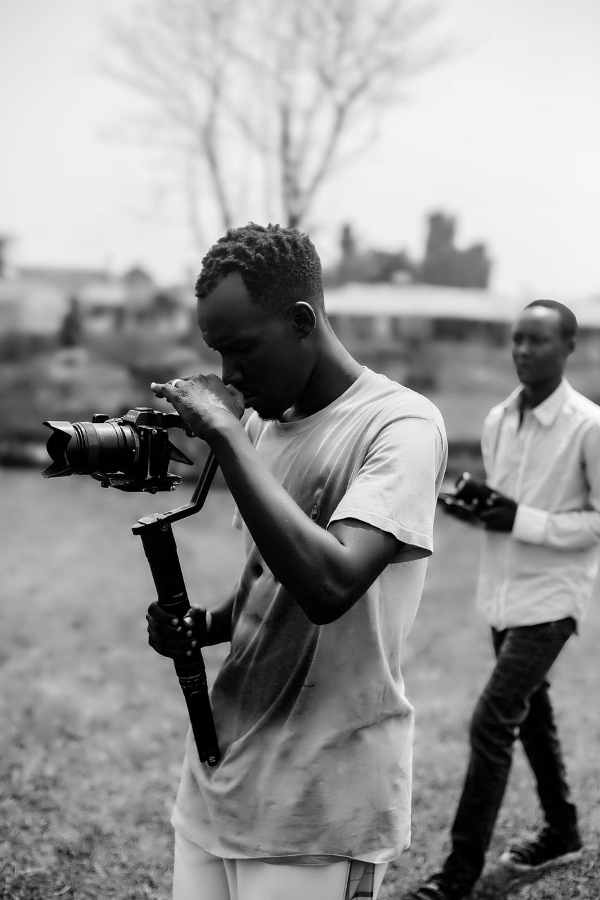 A photojournalist shooting in the field