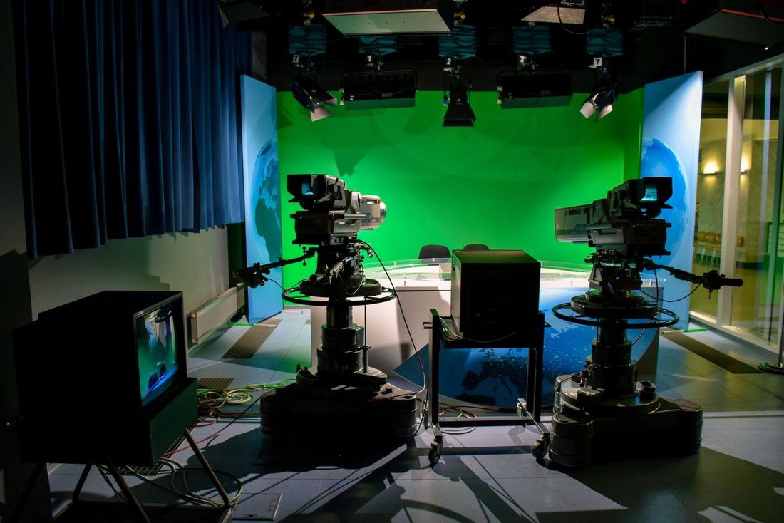 A television studio with cameras ready